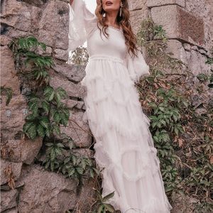 White Jessakae dress, never worn, still has tags on it.